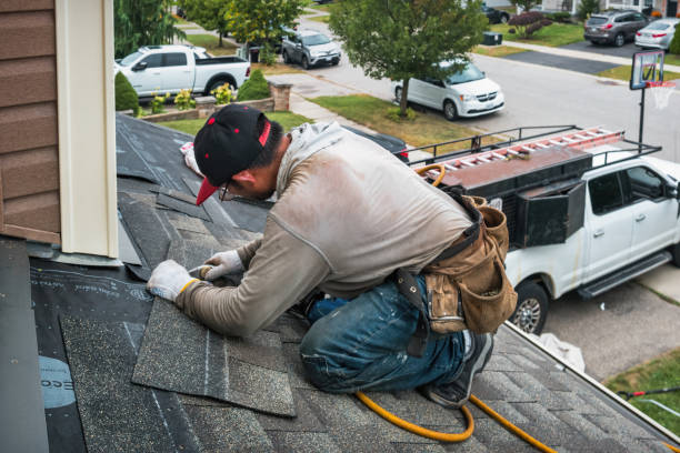 Professional Gutter Installation technician working in Hopkinton, MA